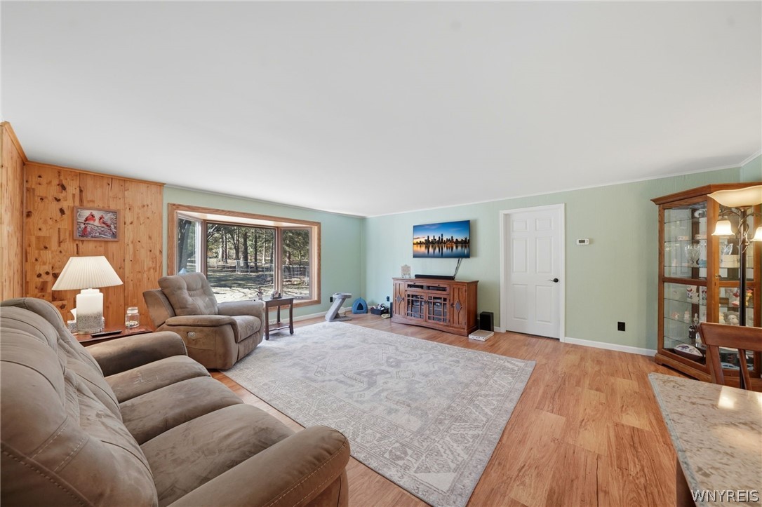 7228 Lower East Hill Road Boston, NY 14033 - Photo 9 of 46 Living room with beautiful view of wooded property