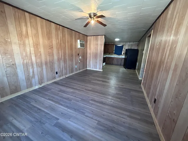 a view of a livingroom with wooden floor