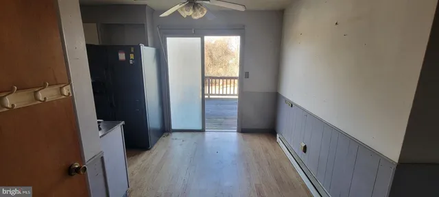 a kitchen with stainless steel appliances a refrigerator and a sink
