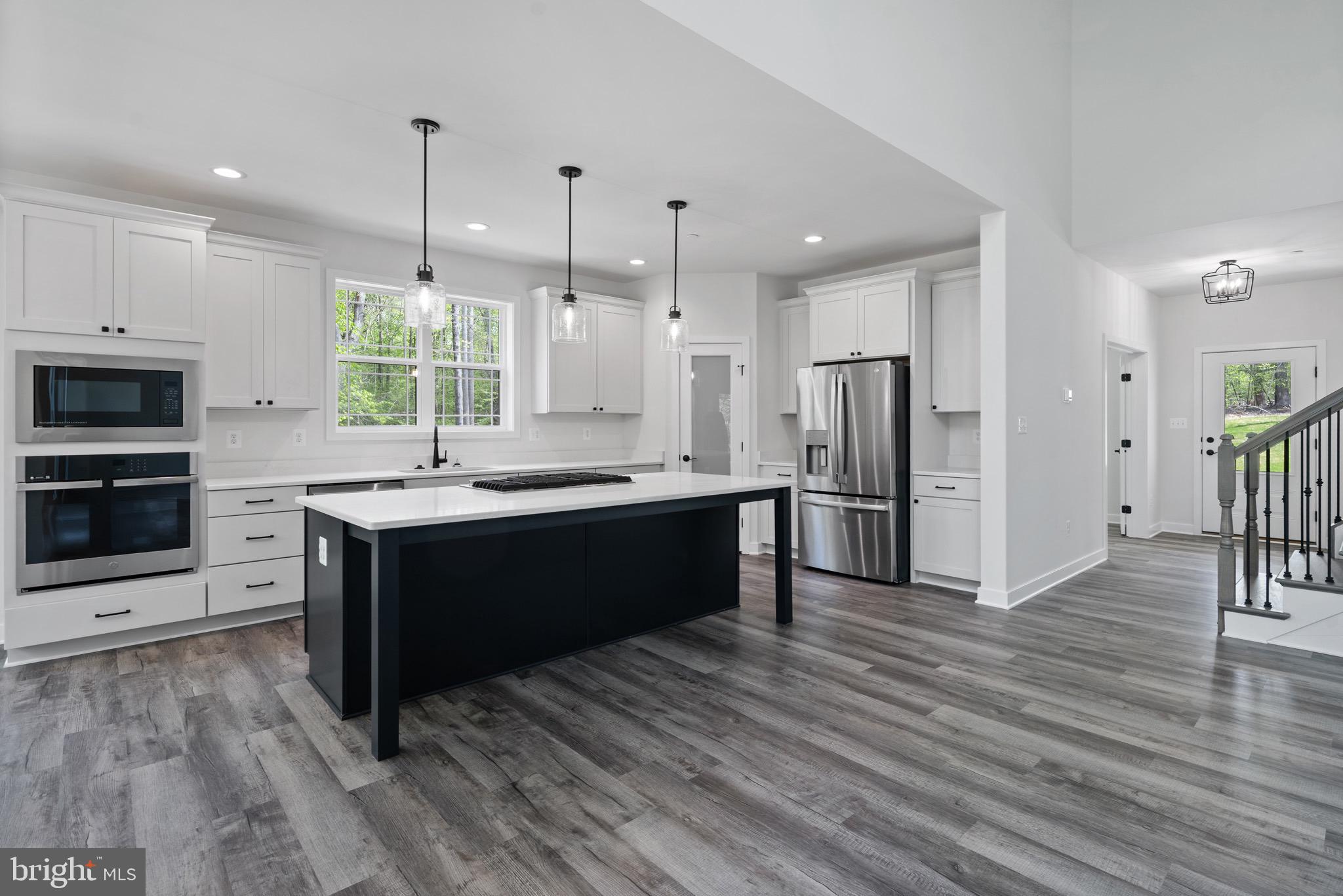 18688 Hebb Rd Valley Valley Lee, MD 20692 - Photo 18 of 57 Modern kitchen with sleek design and light.