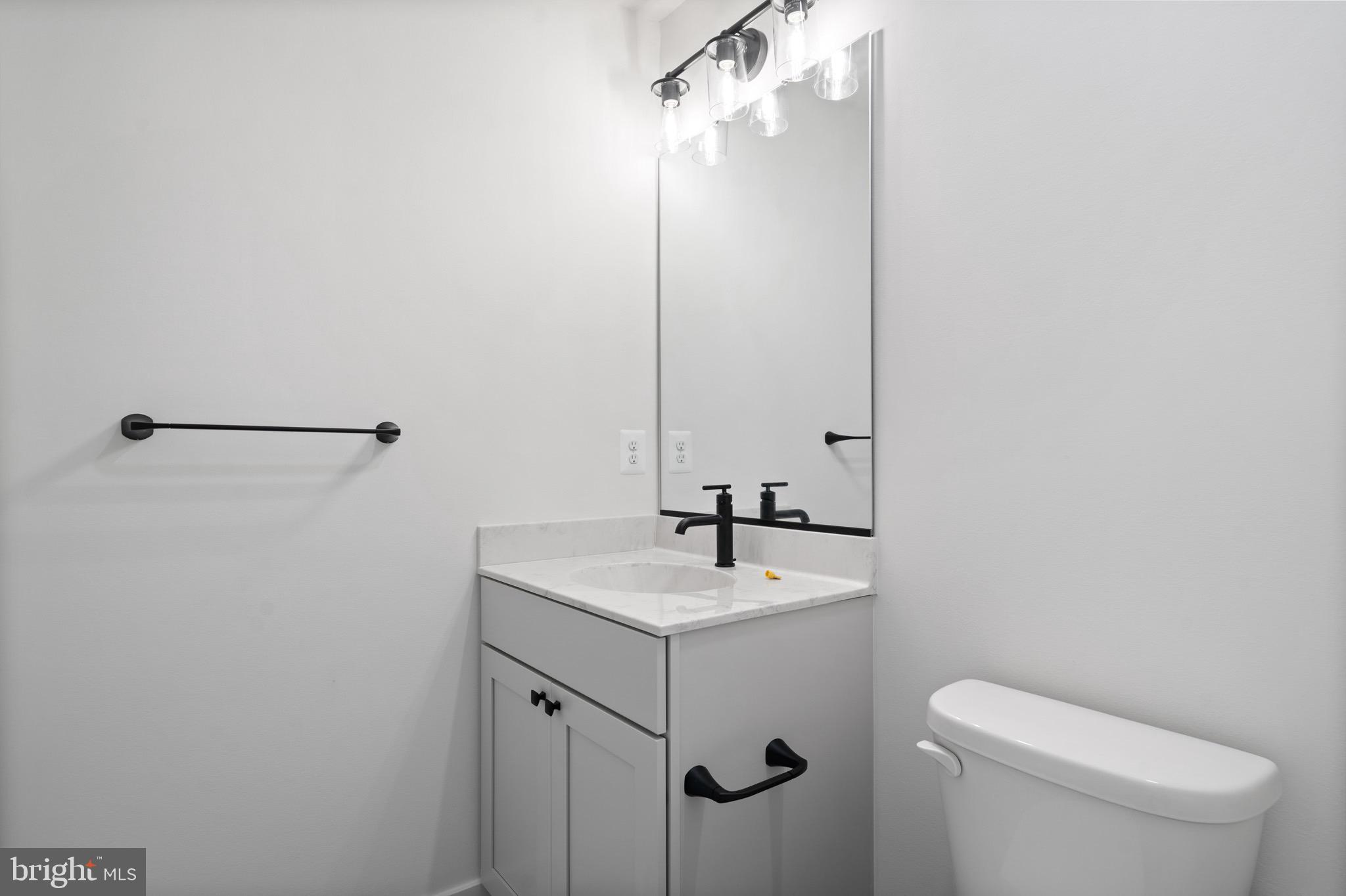 18688 Hebb Rd Valley Valley Lee, MD 20692 - Photo 40 of 57 Sleek modern bathroom with elegant fixtures.