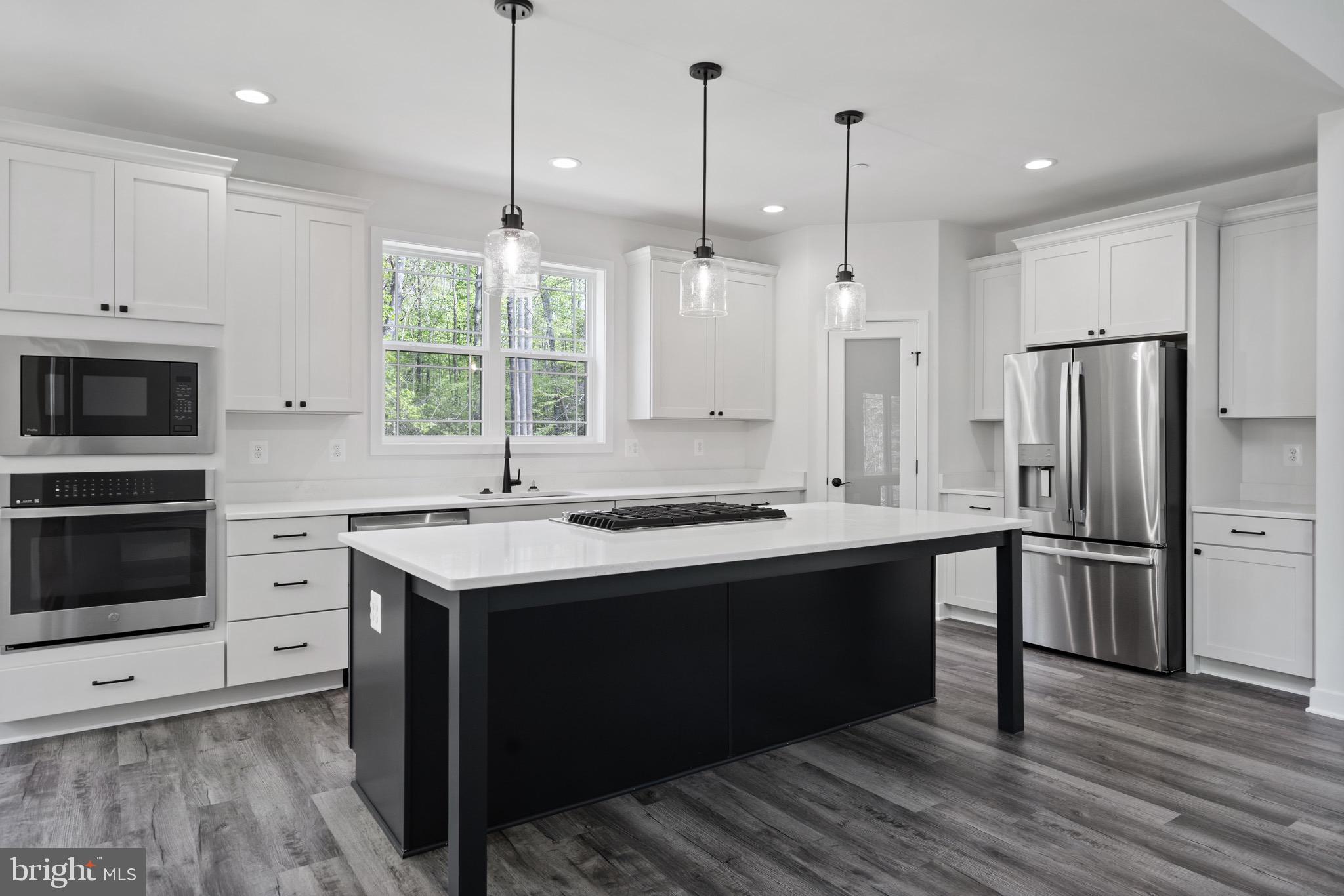 18688 Hebb Rd Valley Valley Lee, MD 20692 - Photo 4 of 57 Modern kitchen with sleek design elements.