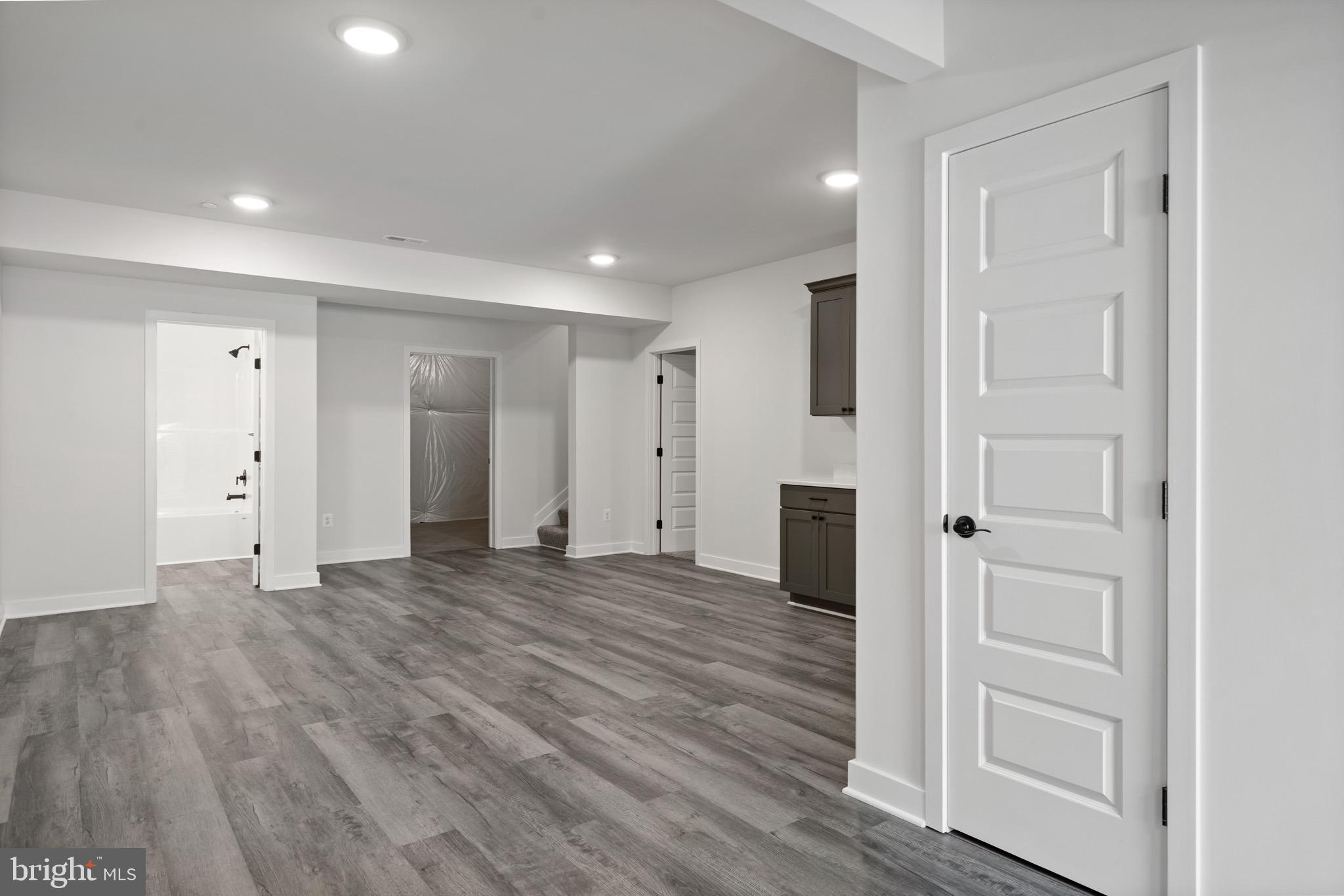 18688 Hebb Rd Valley Valley Lee, MD 20692 - Photo 48 of 57 Spacious, modern living area with sleek design.