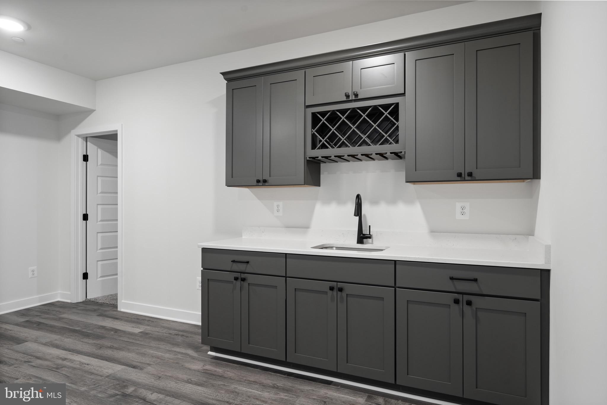 18688 Hebb Rd Valley Valley Lee, MD 20692 - Photo 49 of 57 Sleek modern kitchen with stylish cabinetry.