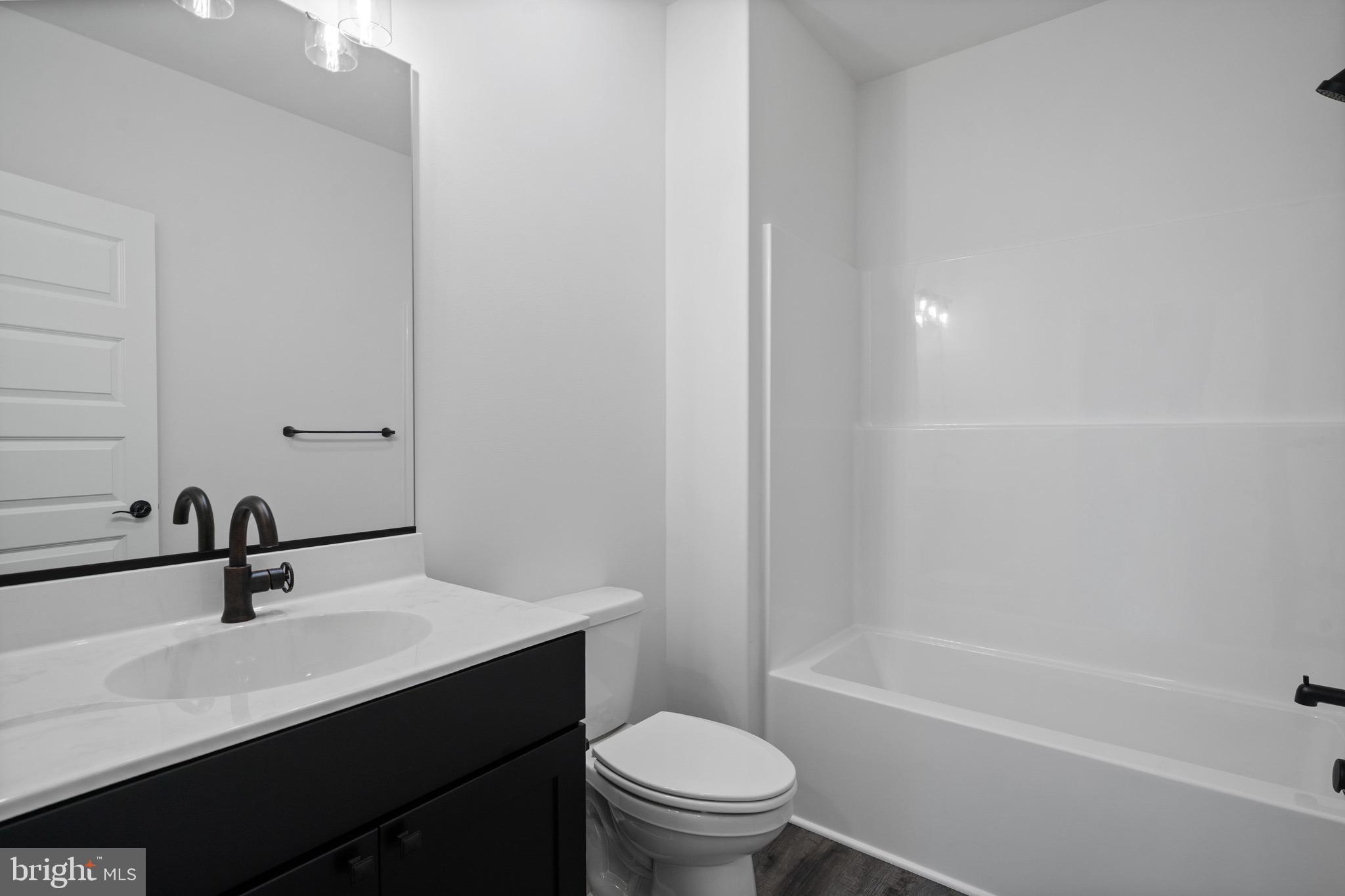 18688 Hebb Rd Valley Valley Lee, MD 20692 - Photo 50 of 57 Sleek modern bathroom with elegant finishes.