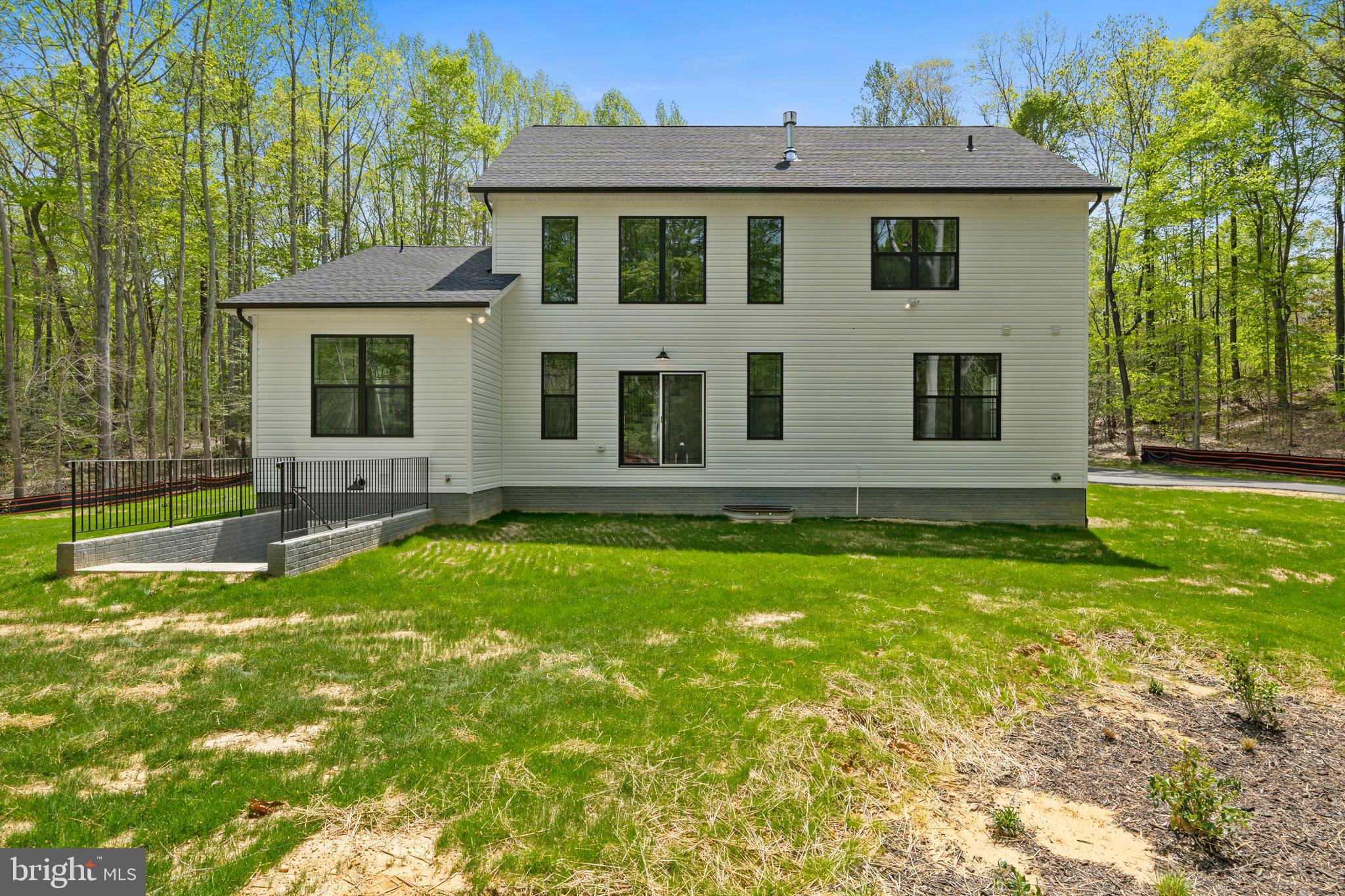 18688 Hebb Rd Valley Valley Lee, MD 20692 - Photo 56 of 57 Modern home nestled in lush greenery.
