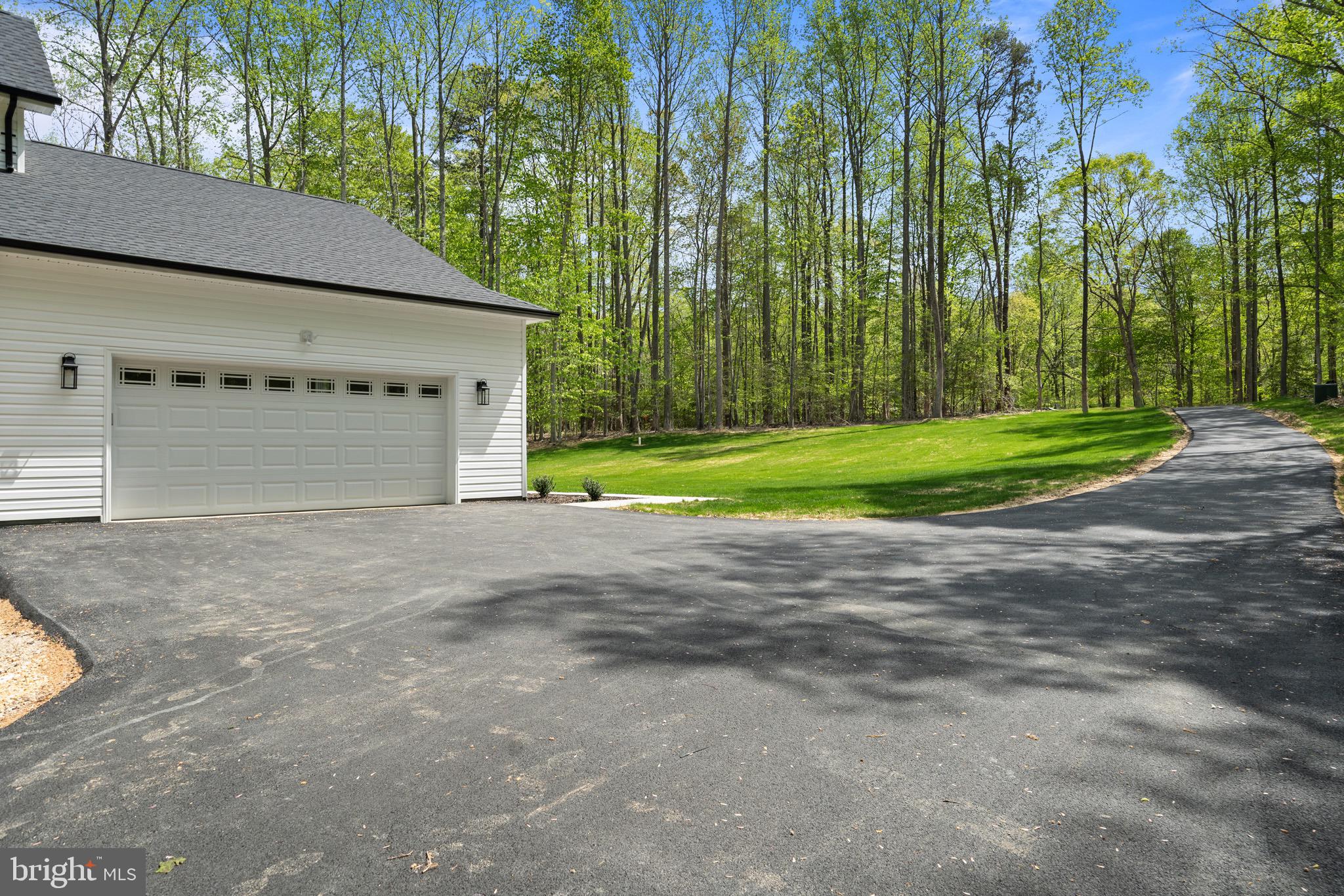 18688 Hebb Rd Valley Valley Lee, MD 20692 - Photo 57 of 57 Serene driveway leading to a wooded retreat.
