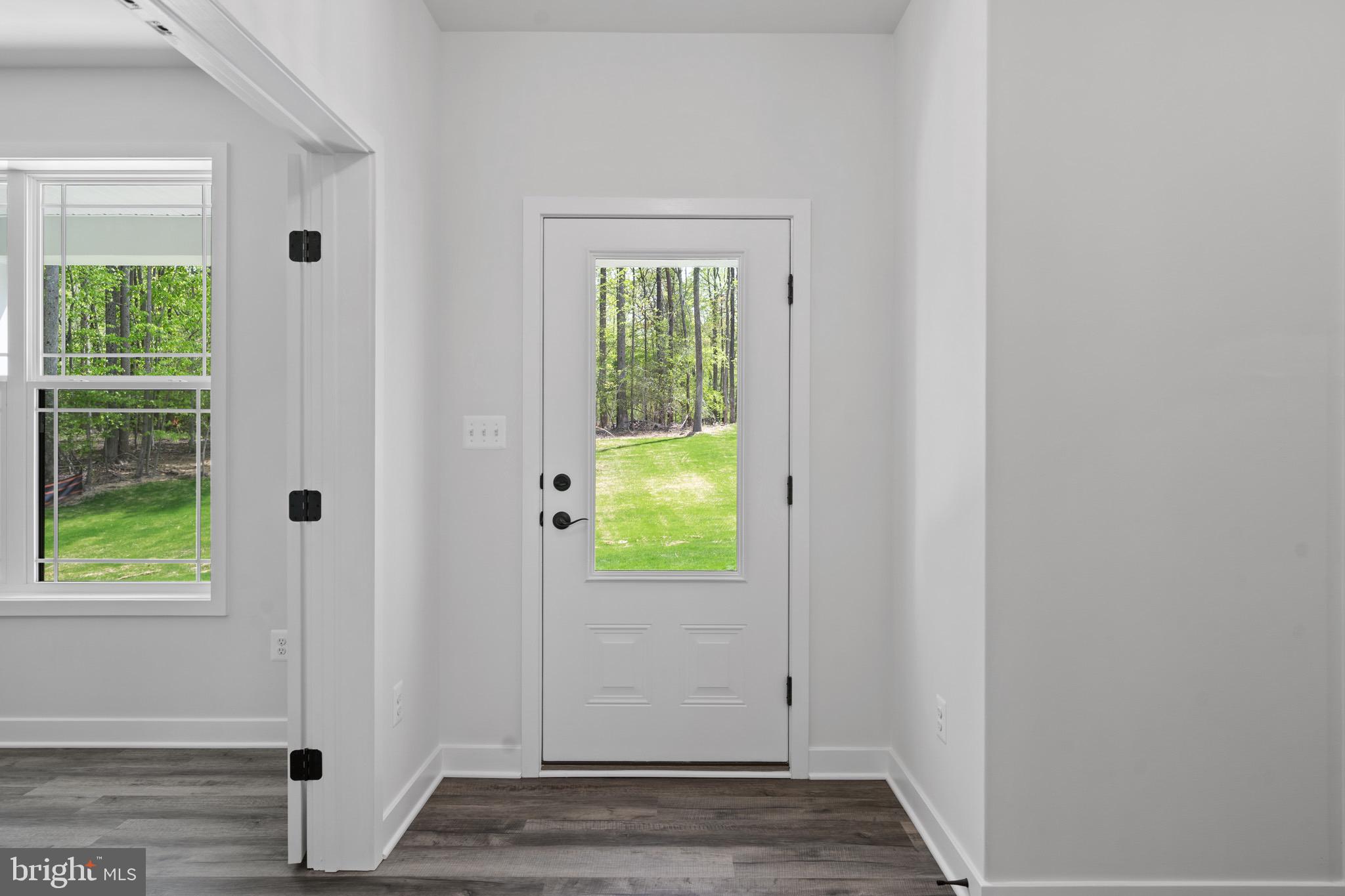 18688 Hebb Rd Valley Valley Lee, MD 20692 - Photo 9 of 57 Bright entryway with serene outdoor views.