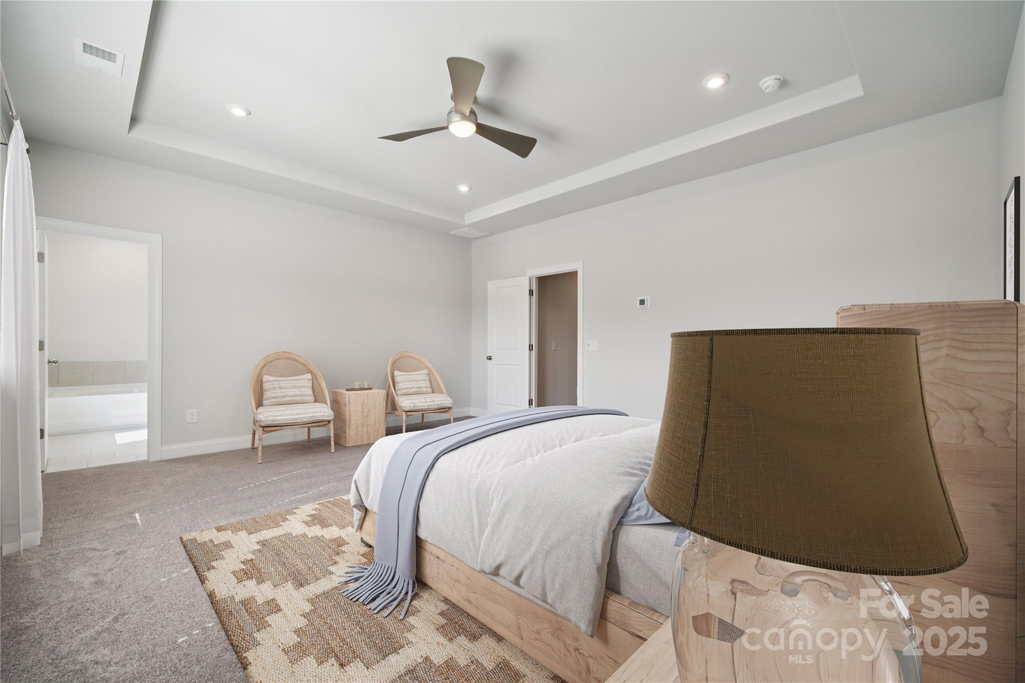 1233 Margo Mannor None Fort Mill Fort Mill, SC 29708 - Photo 6 of 34 a bedroom with a bed and a large mirror