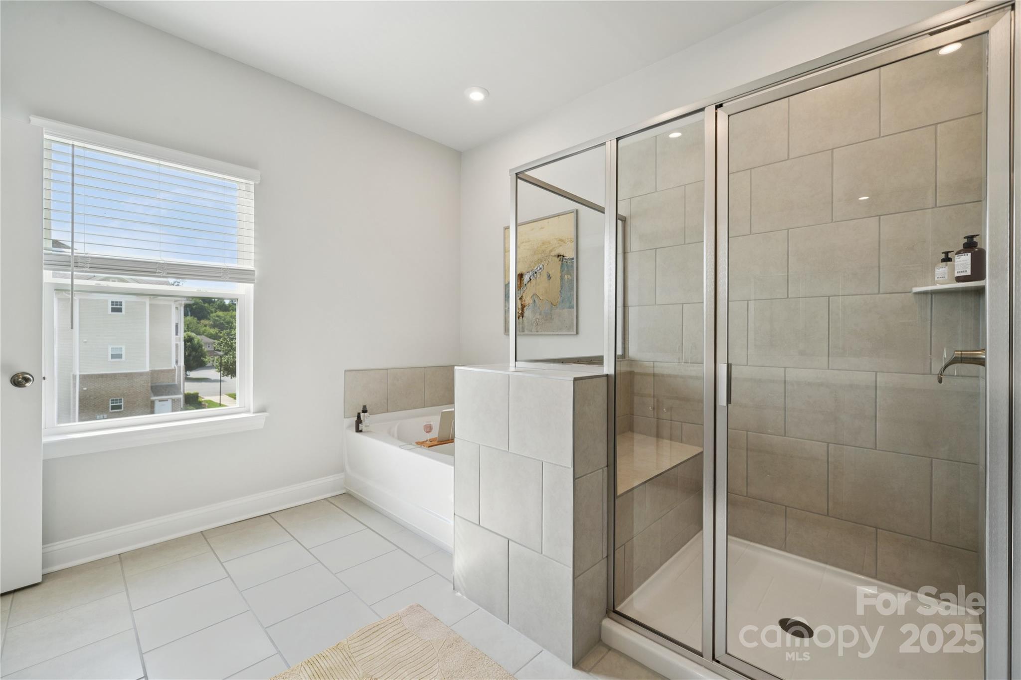 1233 Margo Mannor None Fort Mill Fort Mill, SC 29708 - Photo 7 of 34 a bathroom with a bathtub and a shower