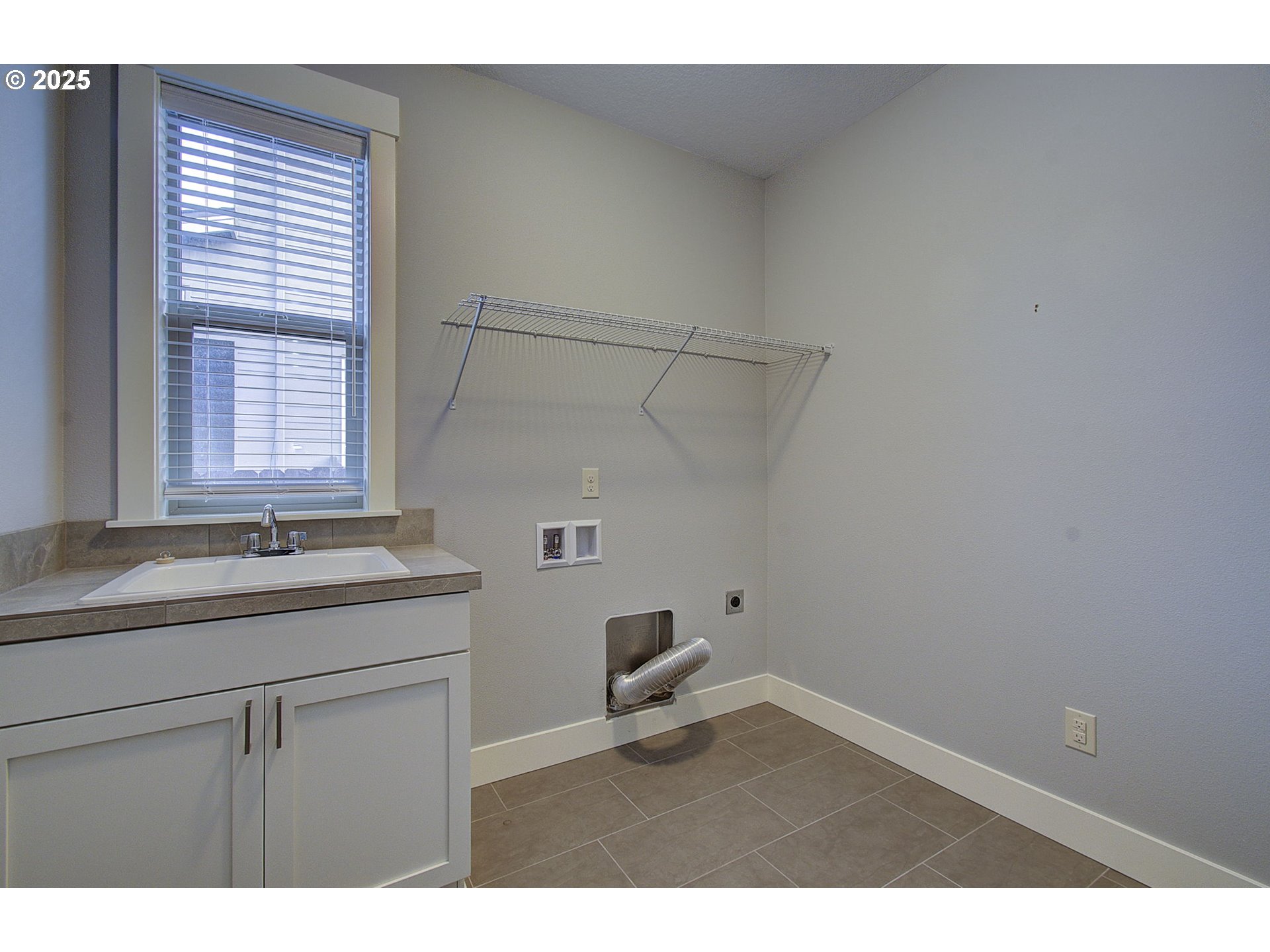 5305 Northeast 134th Street Vancouver, WA 98686 - Photo 13 of 36 a bathroom with a sink and a vanity