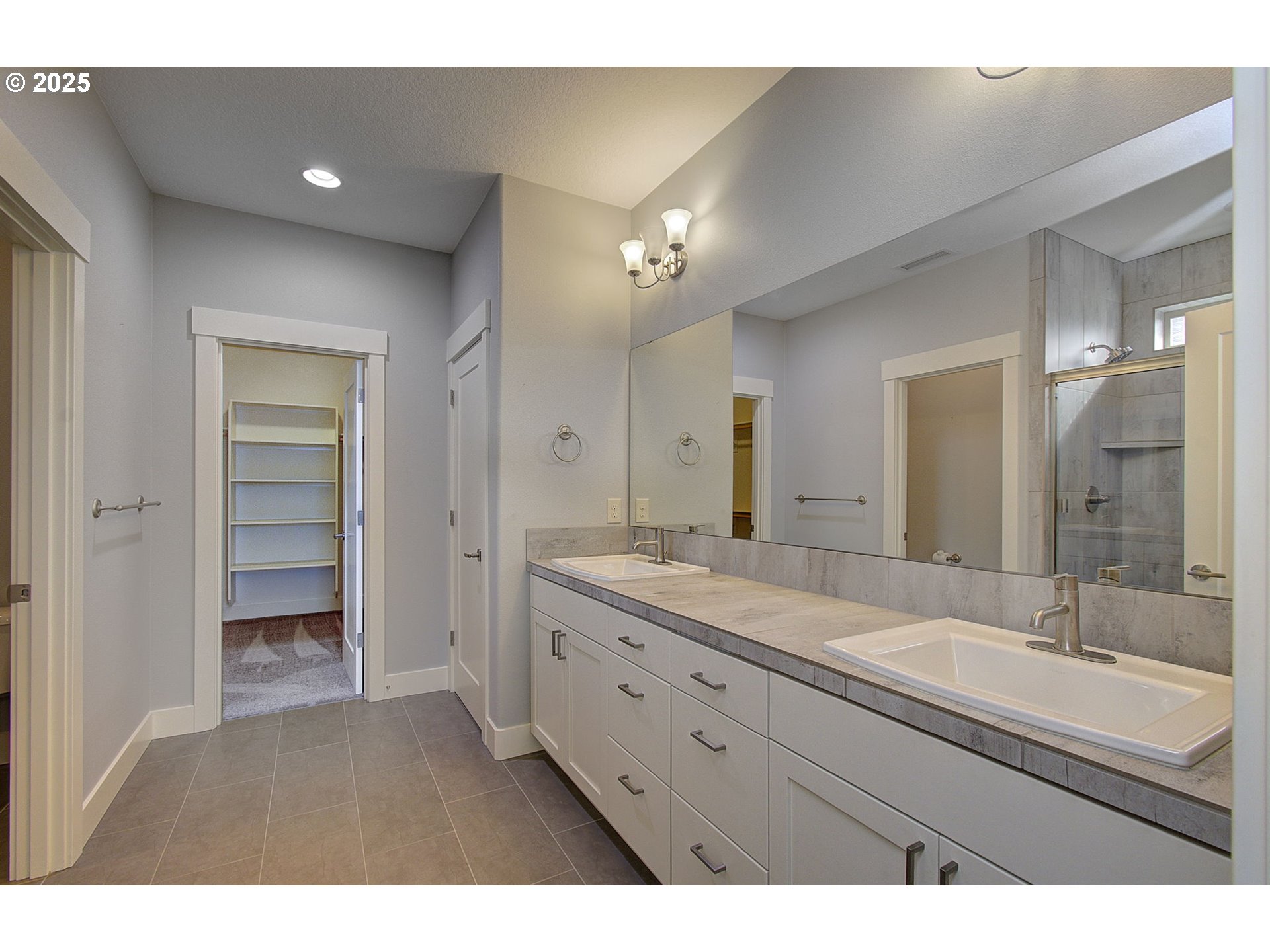 5305 Northeast 134th Street Vancouver, WA 98686 - Photo 22 of 36 a bathroom with a granite countertop sink mirror and double