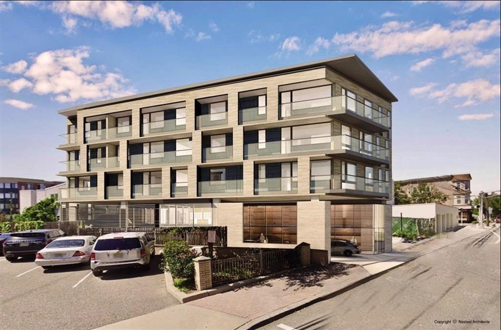 a front view of a building with street