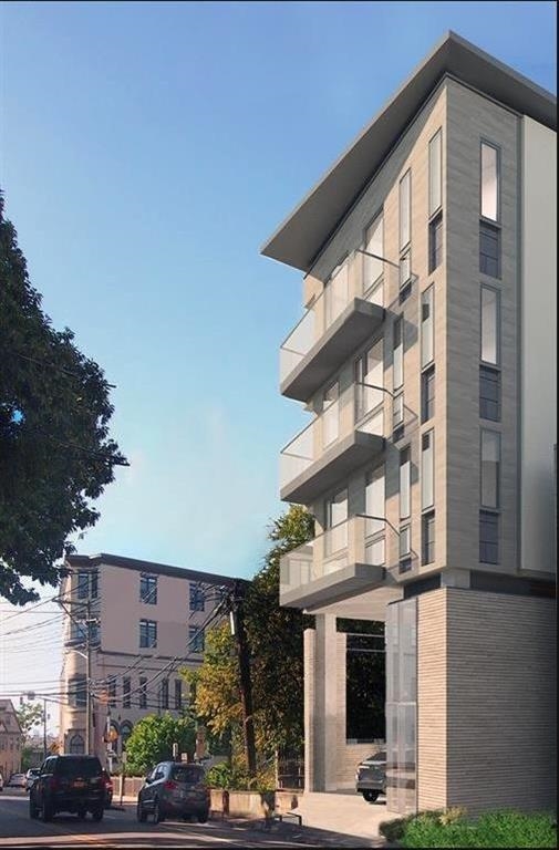115-117 Hackensack Plank Road Weehawken, NJ 07086 - Photo 5 of 18 a view of a building with a street