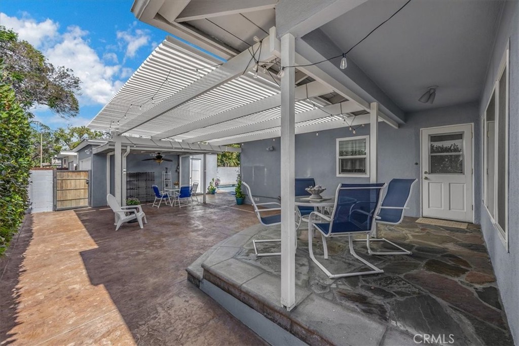 2956 Monogram Avenue Long Beach, CA 90815 - Photo 21 of 29 a view of a dinning table and chairs in the porch