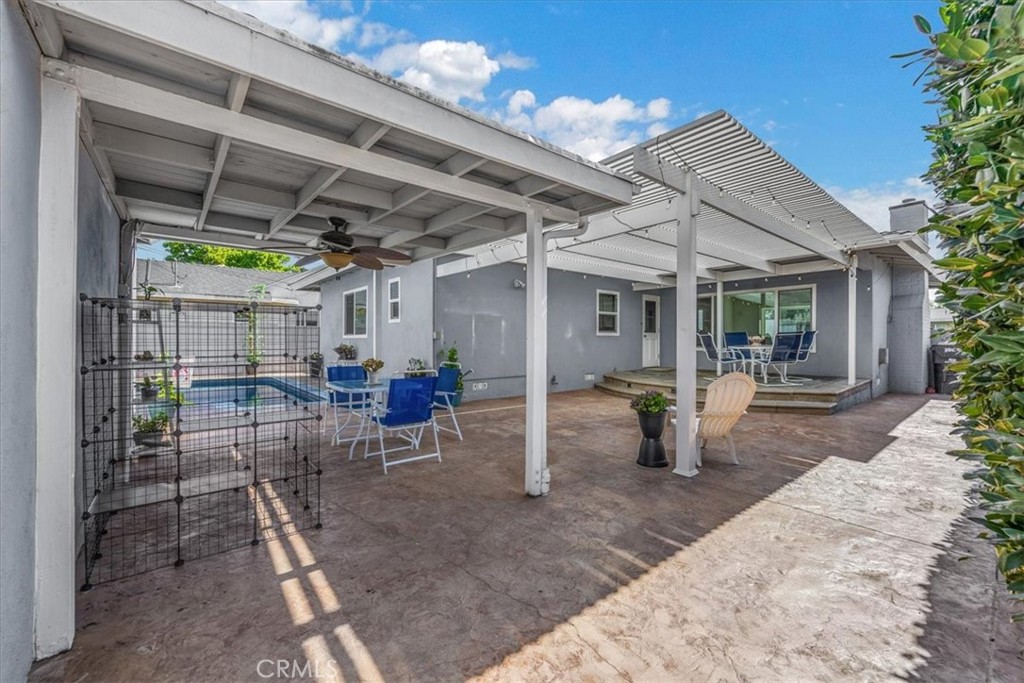 2956 Monogram Avenue Long Beach, CA 90815 - Photo 22 of 29 a view of a chairs and tables in patio
