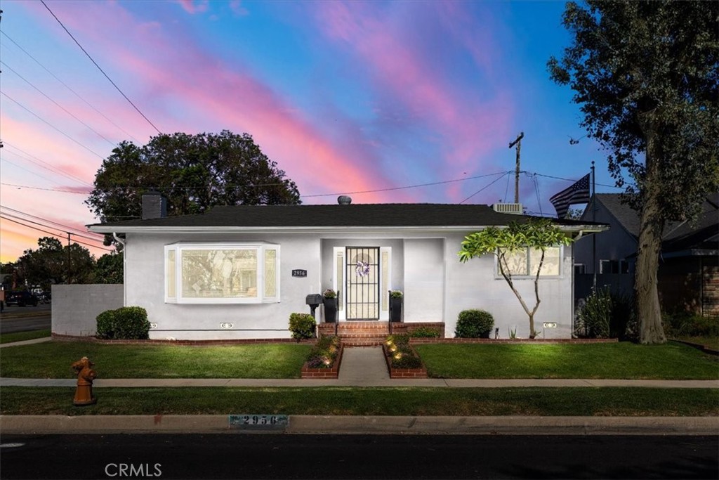 2956 Monogram Avenue Long Beach, CA 90815 - Photo 28 of 29 a front view of a house with garden