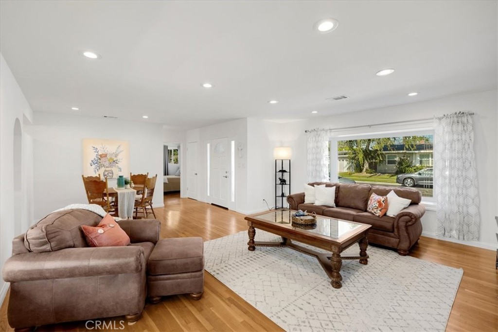 2956 Monogram Avenue Long Beach, CA 90815 - Photo 6 of 29 a living room with furniture and a large window