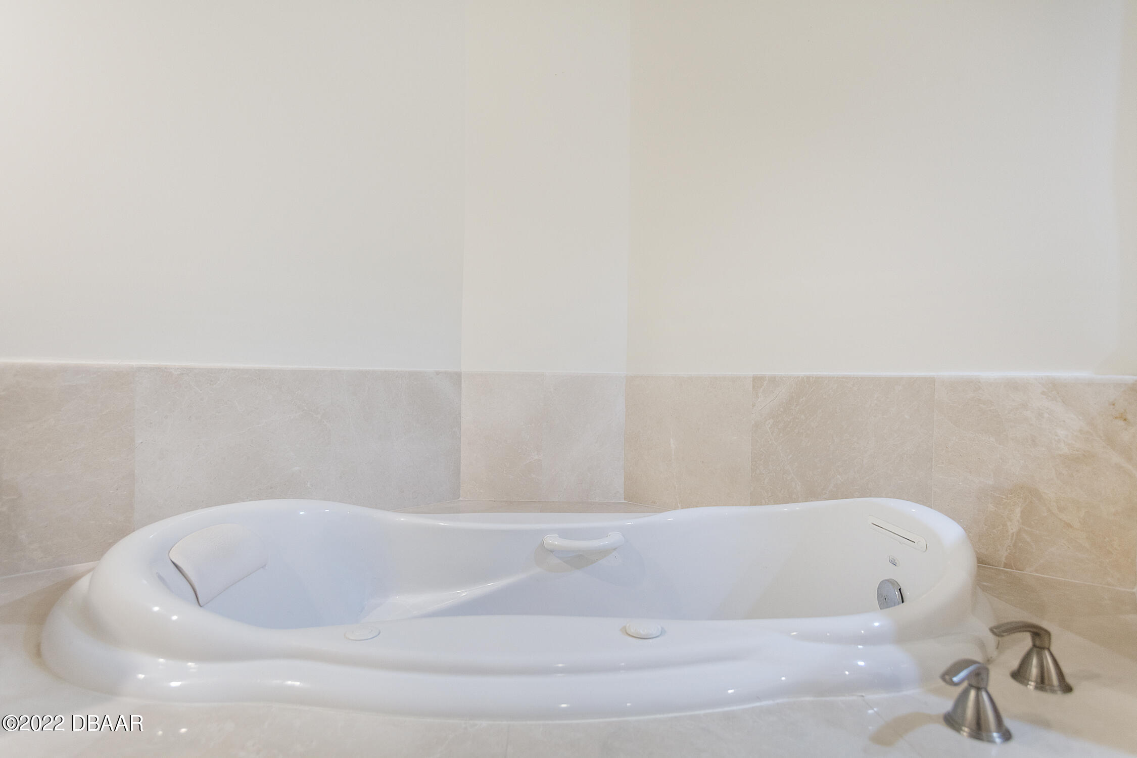 231 Riverside Drive, Unit 11061 Holly Hill, FL 32117 - Photo 31 of 64 a bathroom with a bathtub