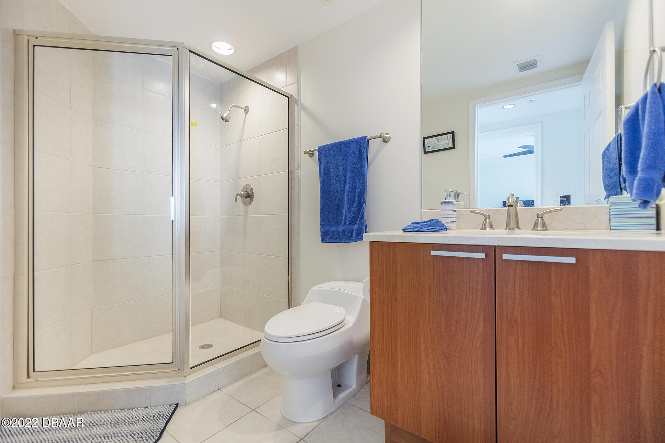 231 Riverside Drive, Unit 11061 Holly Hill, FL 32117 - Photo 37 of 64 a bathroom with a sink toilet and shower