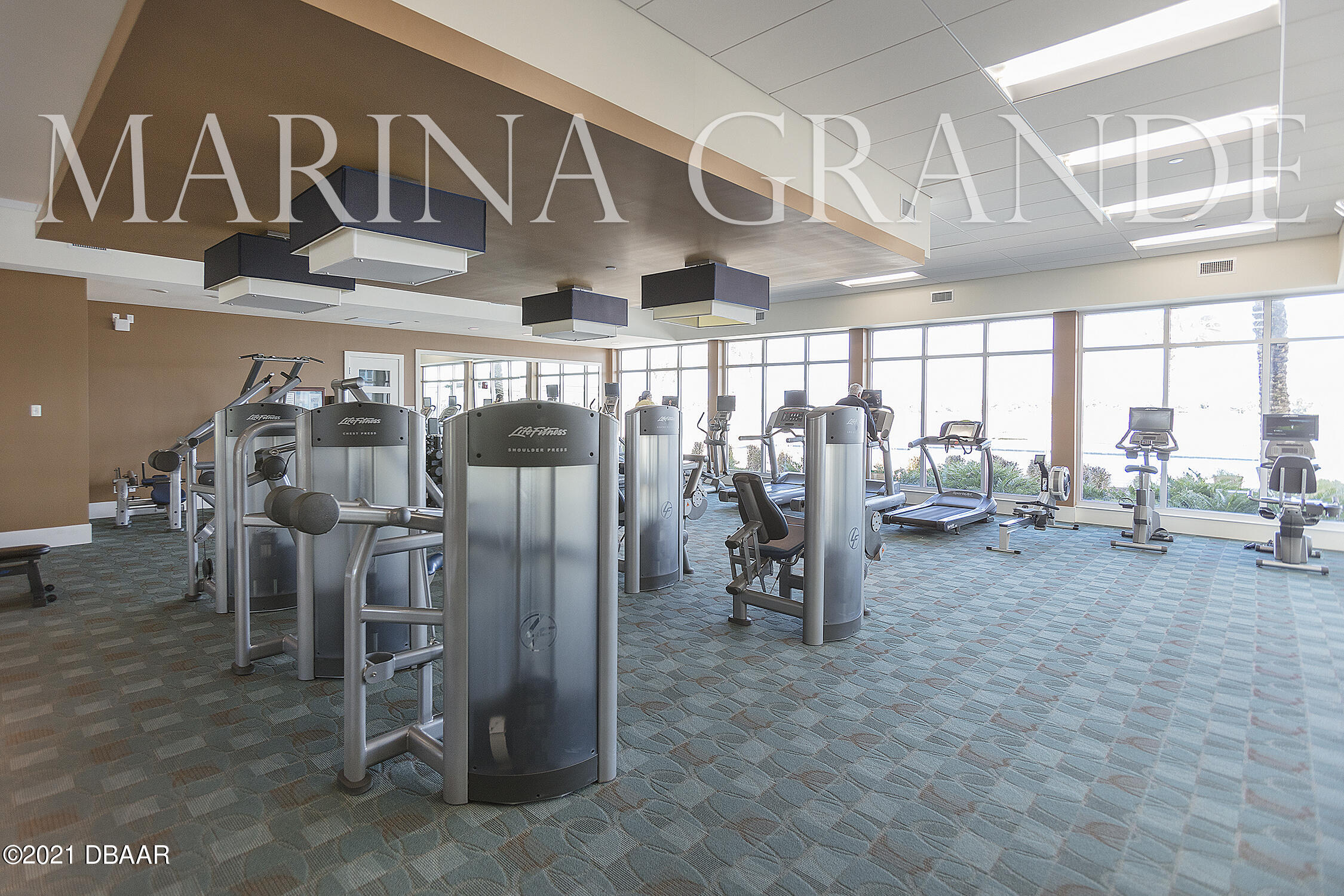 231 Riverside Drive, Unit 11061 Holly Hill, FL 32117 - Photo 51 of 64 a view of a room with gym equipment