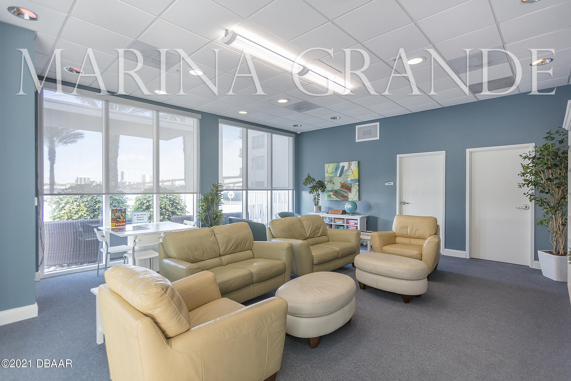 231 Riverside Drive, Unit 11061 Holly Hill, FL 32117 - Photo 52 of 64 a living room with furniture and a large window