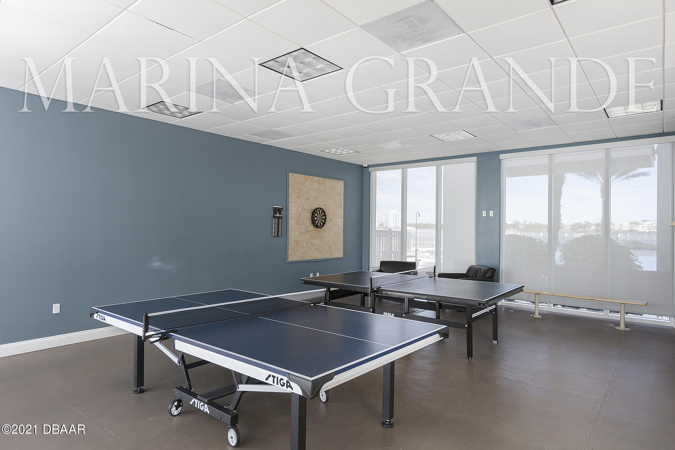 231 Riverside Drive, Unit 11061 Holly Hill, FL 32117 - Photo 54 of 64 a room with pool table and windows