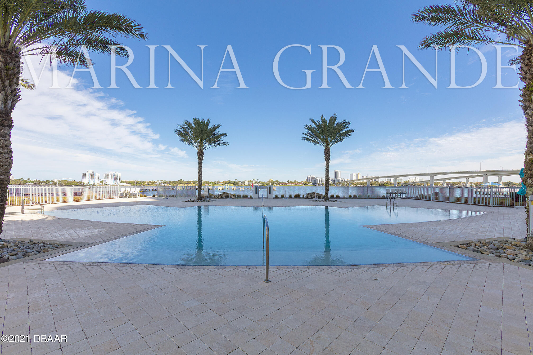231 Riverside Drive, Unit 11061 Holly Hill, FL 32117 - Photo 55 of 64 a view of a street with a building in the background