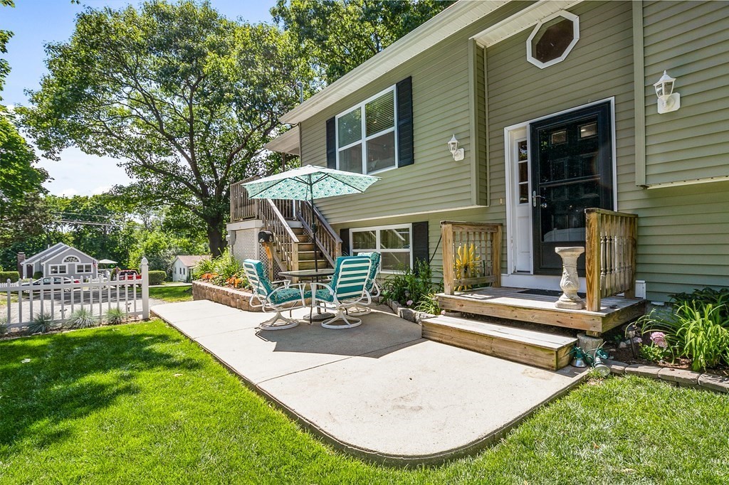 111 Wompatuck Road Hingham, MA 02043 - Photo 19 of 33 a view of a house with backyard porch and sitting area