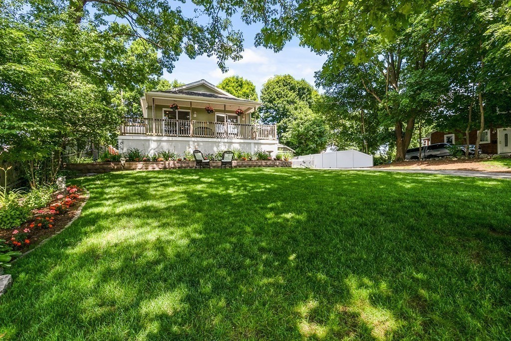 111 Wompatuck Road Hingham, MA 02043 - Photo 25 of 33 a front view of a house with a yard
