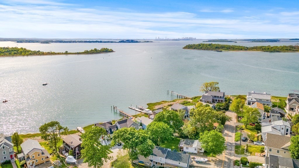 111 Wompatuck Road Hingham, MA 02043 - Photo 30 of 33 a view of a lake with a mountain in the back