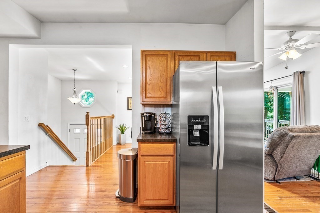 111 Wompatuck Road Hingham, MA 02043 - Photo 8 of 33 a kitchen with stainless steel appliances granite countertop a refrigerator and microwave