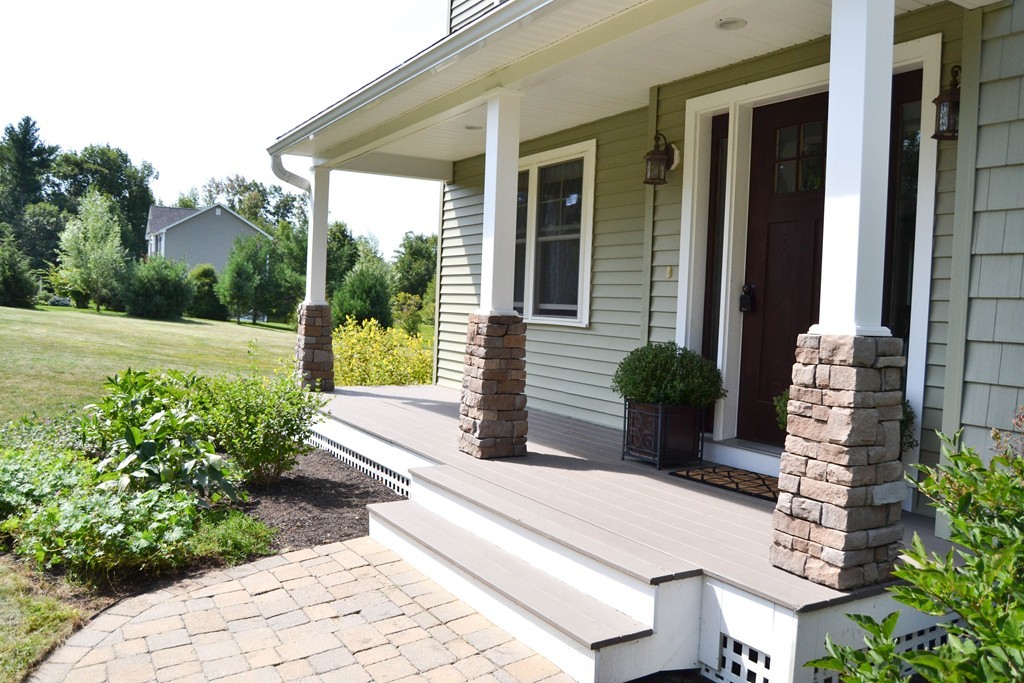 89 Davis Road Westminster, MA 01473 - Photo 2 of 25 a view of a house with backyard and garden
