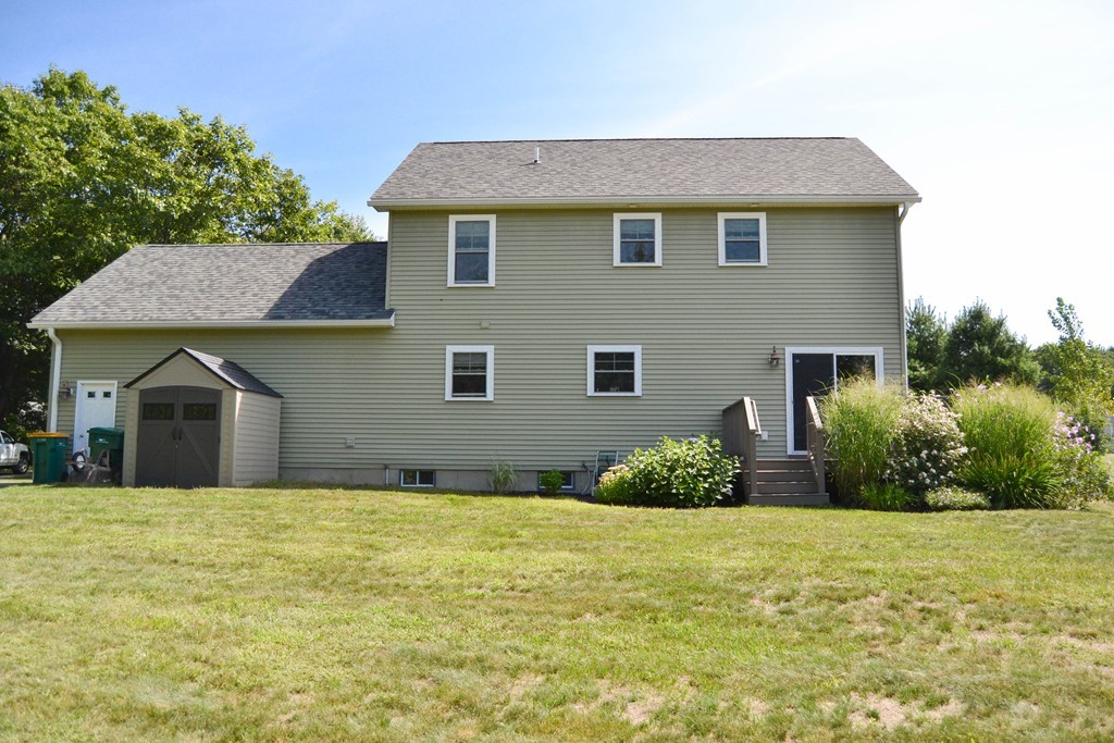 89 Davis Road Westminster, MA 01473 - Photo 23 of 25 a front view of a house with a yard