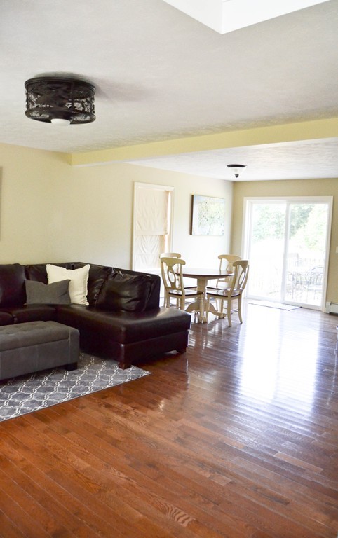 89 Davis Road Westminster, MA 01473 - Photo 4 of 25 a living room with furniture and a large window