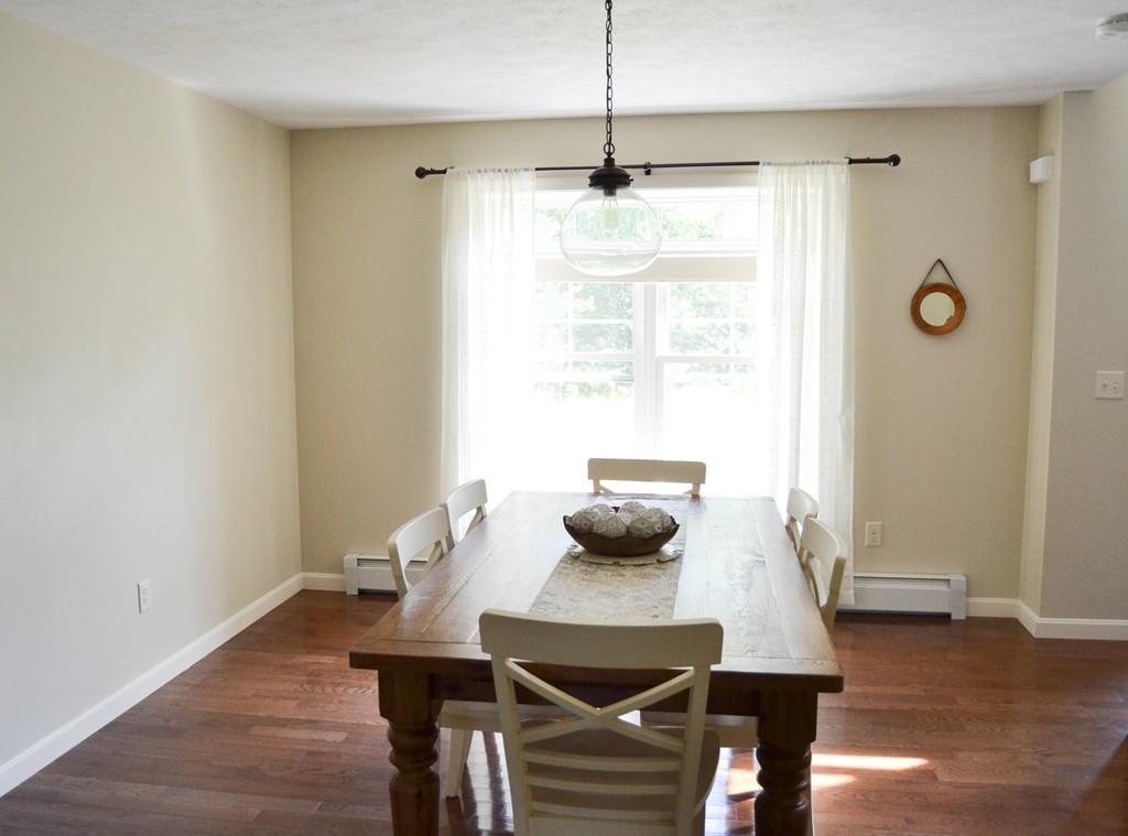 89 Davis Road Westminster, MA 01473 - Photo 10 of 25 a view of a dining room with furniture window and wooden floor