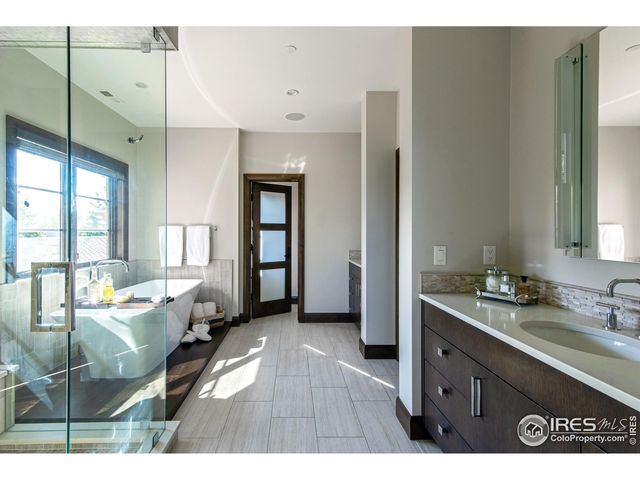 a open kitchen with sink and cabinets