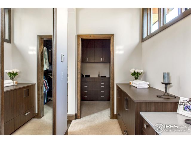 a view of a kitchen from the hallway