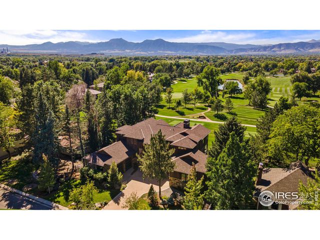 a view of a city with mountains in the background