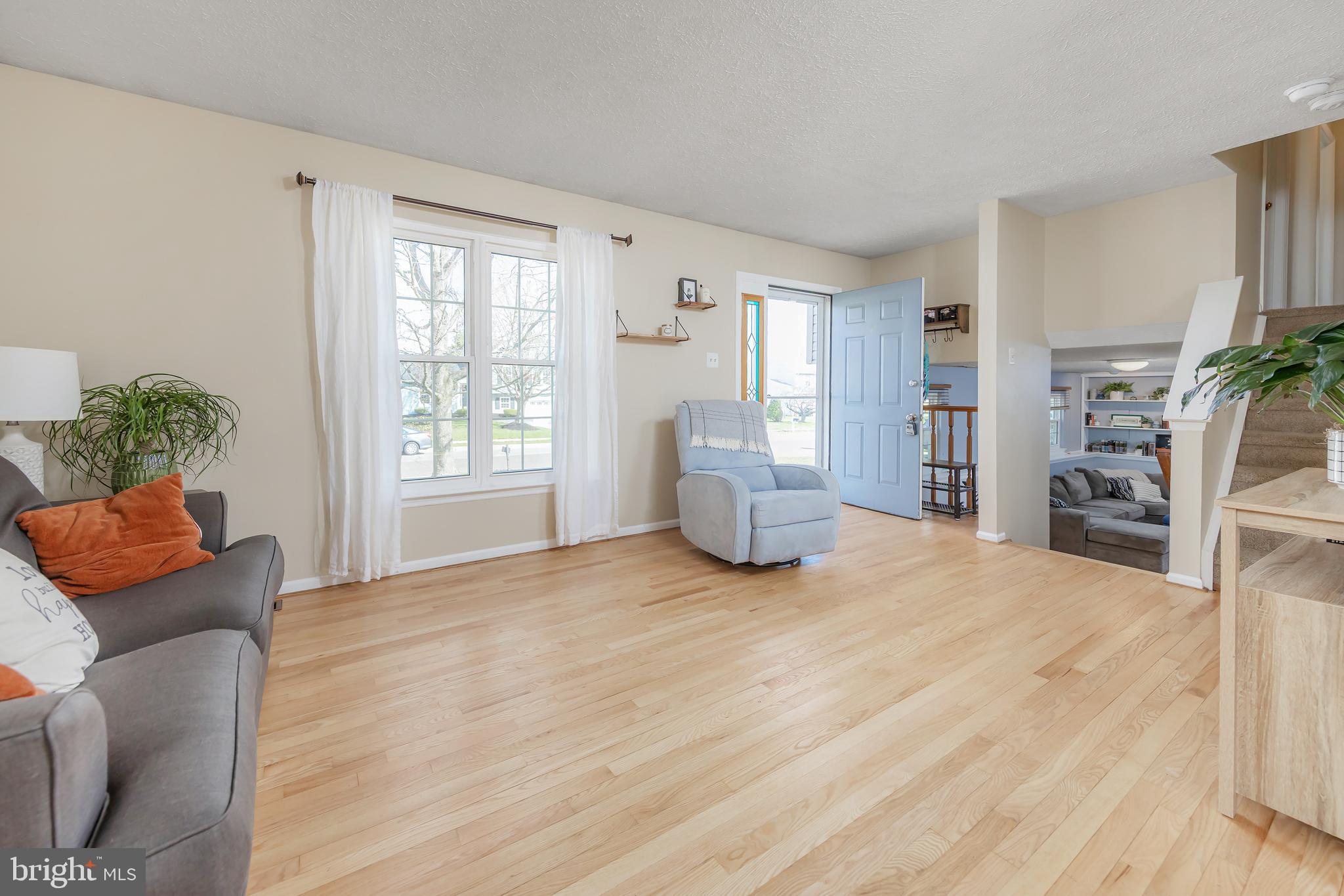 4 Ware Drive Glassboro, NJ 08028 - Photo 12 of 20 a living room with furniture and a large window