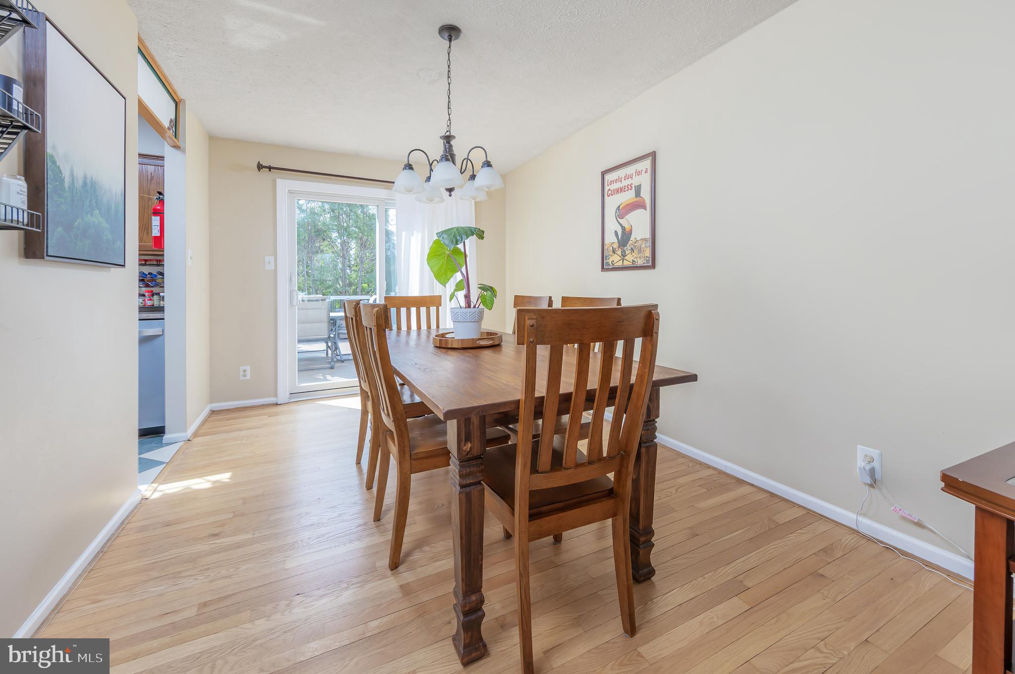 4 Ware Drive Glassboro, NJ 08028 - Photo 13 of 20 a view of a dining room with furniture wooden floor and a chandelier