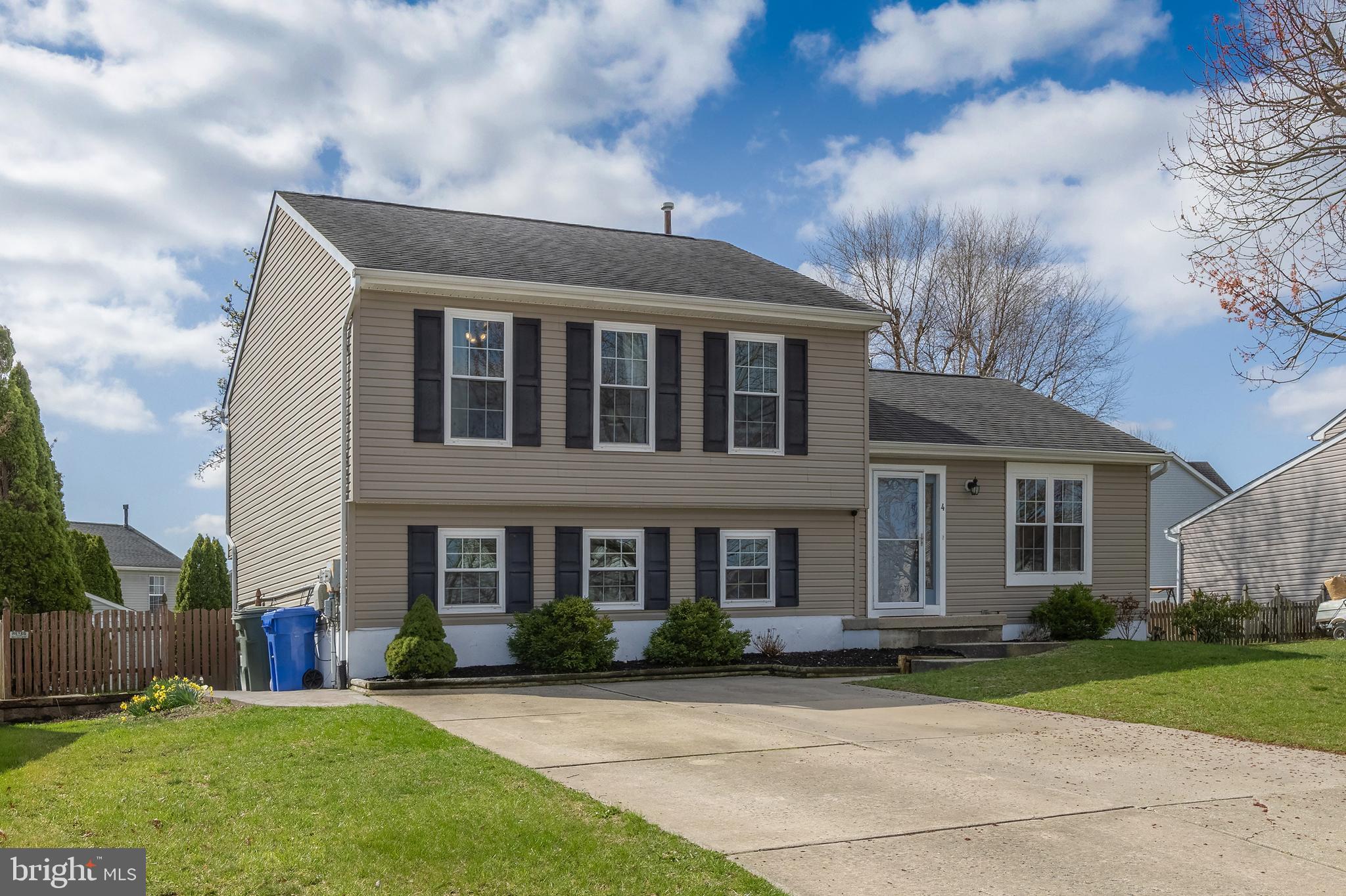 4 Ware Drive Glassboro, NJ 08028 - Photo 3 of 20 a front view of a house with a yard