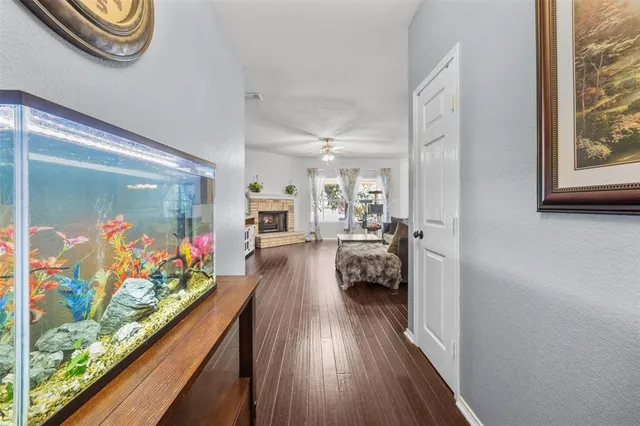 a view of a room and wooden floor