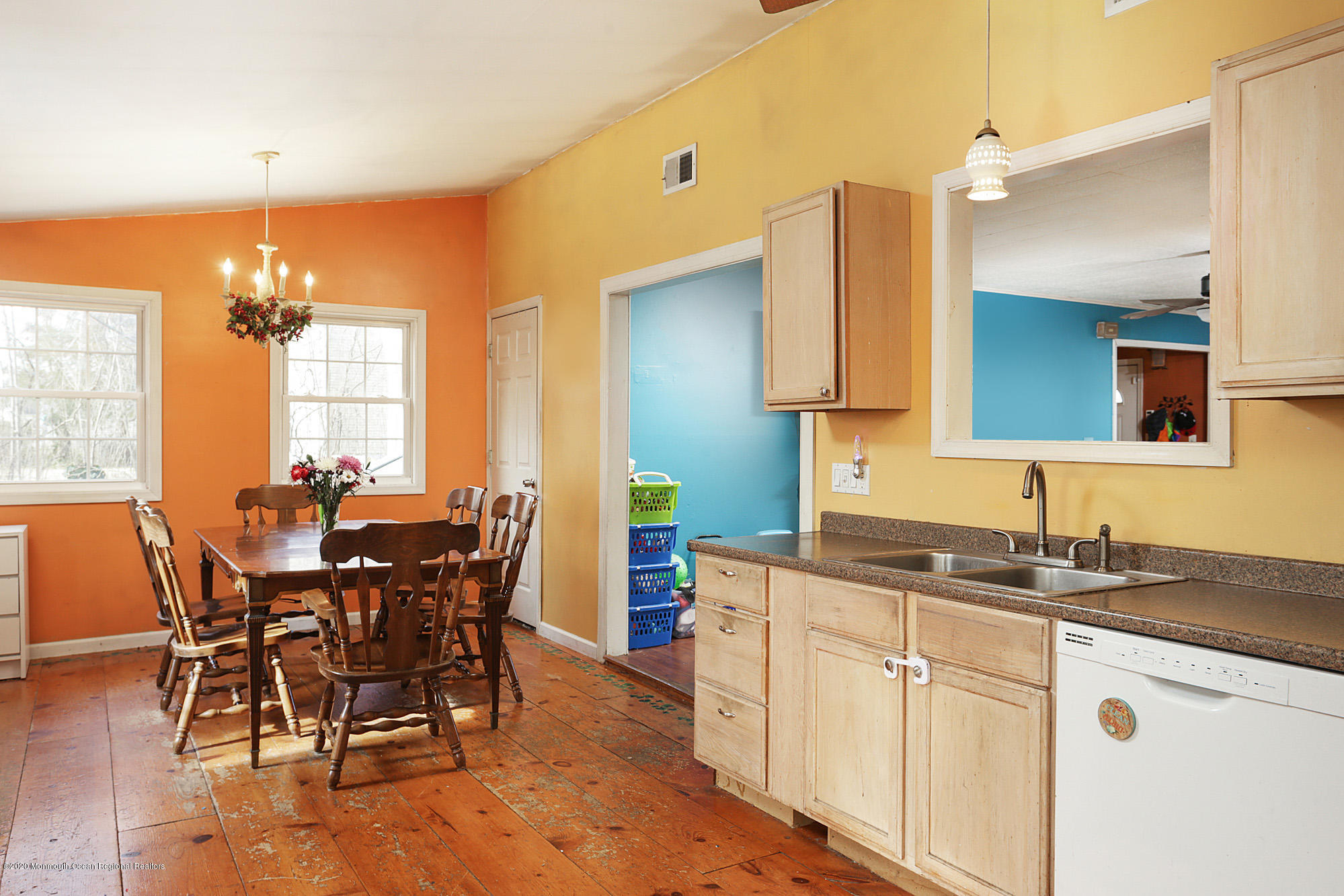 444 Alfred Road Toms River, NJ 08757 - Photo 5 of 13 a kitchen with a dining table chairs and white cabinets