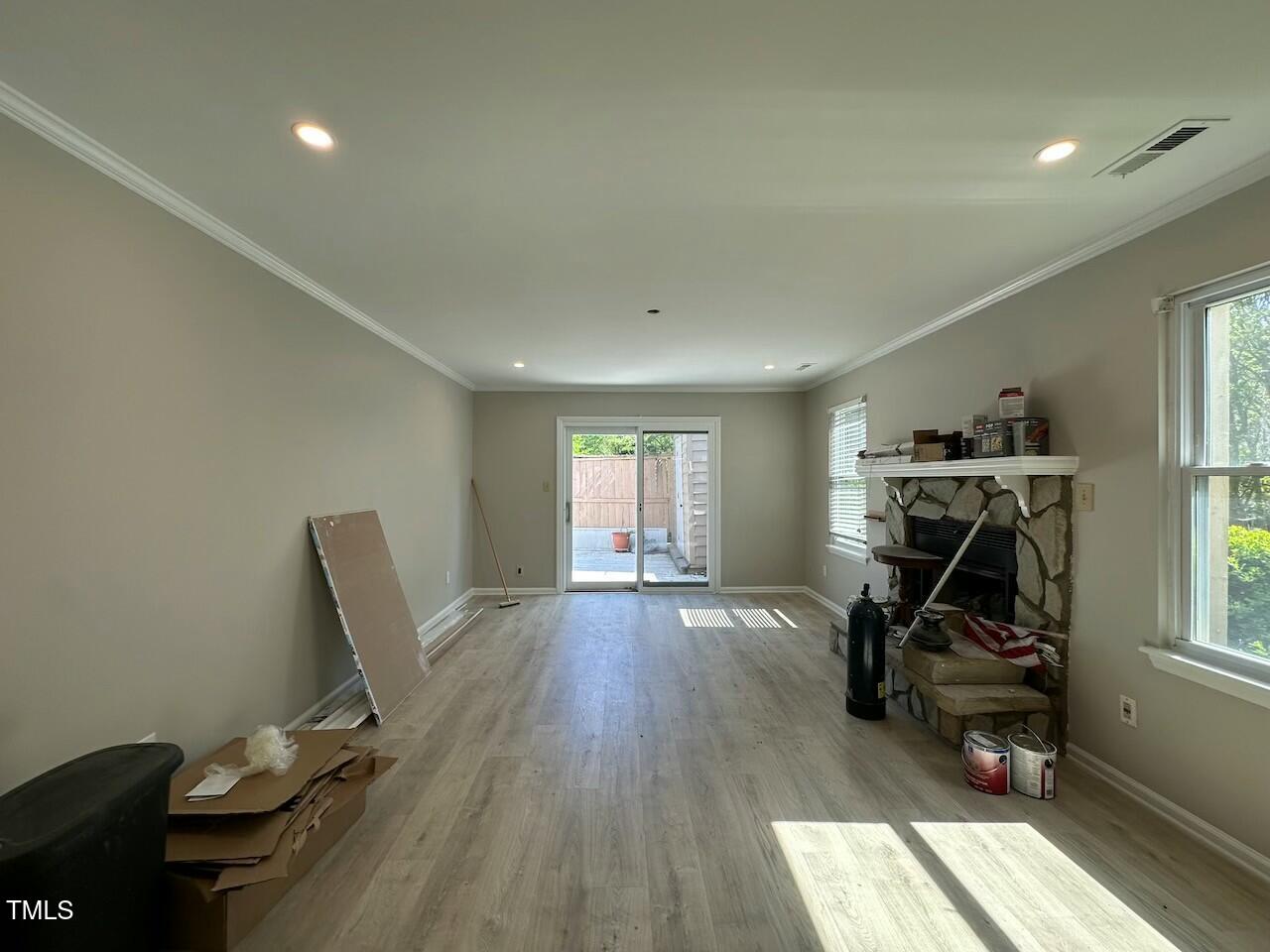 5400 Pine Top Circle Raleigh, NC 27612 - Photo 7 of 18 a view of a room with gym equipment and wooden floor