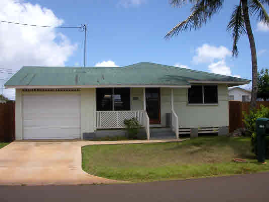 4896 Nunu Road Kapaa, HI 96746 - Photo 1 of 10 a front view of a house with garden