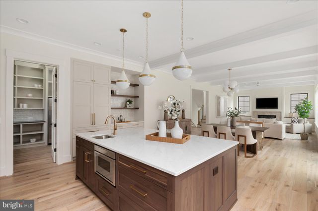 a view of a kitchen with cabinets