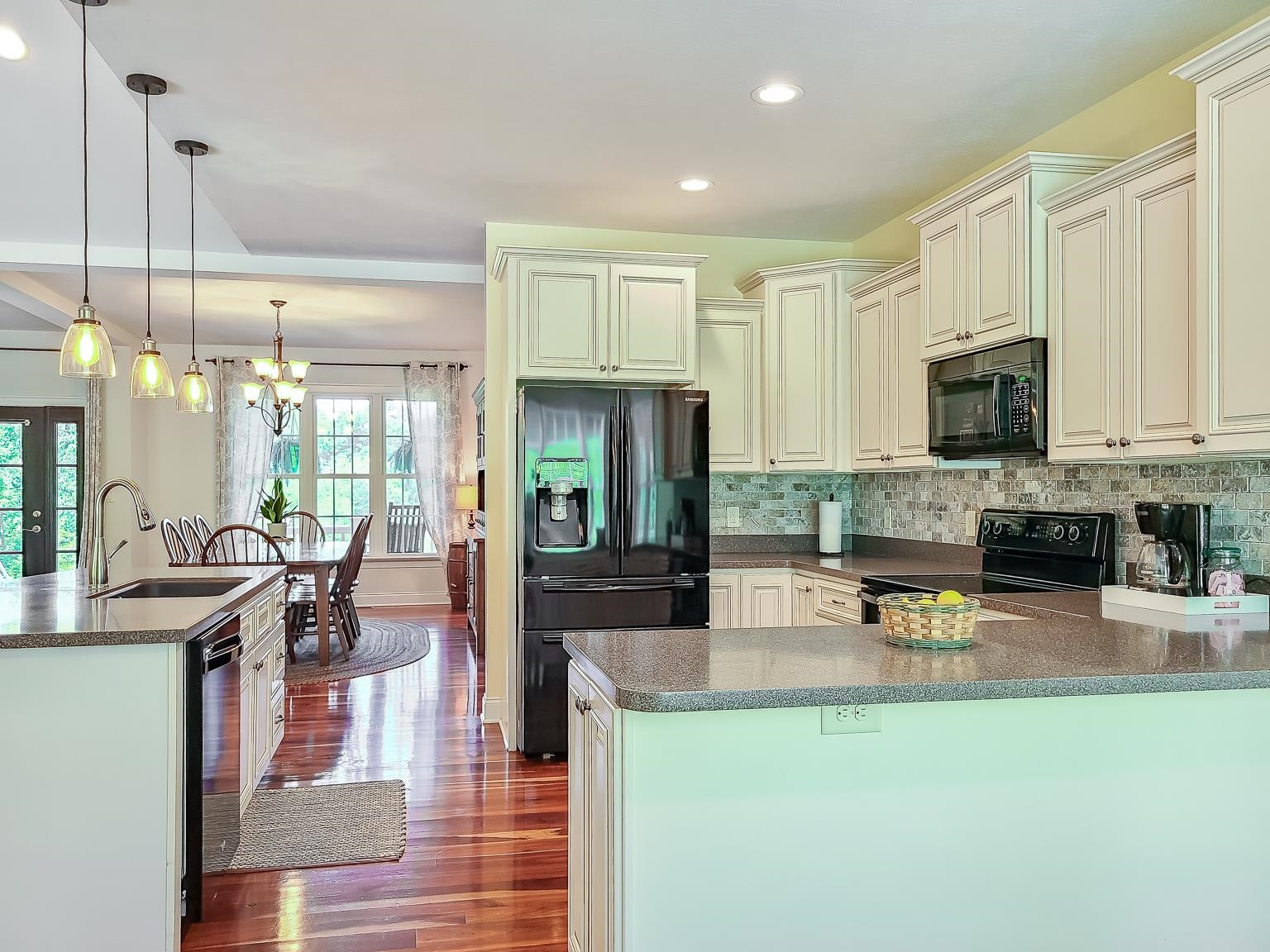 6089 Faughts Road Mount Crawford, VA 22841 - Photo 12 of 68 a kitchen with sink a microwave and chairs