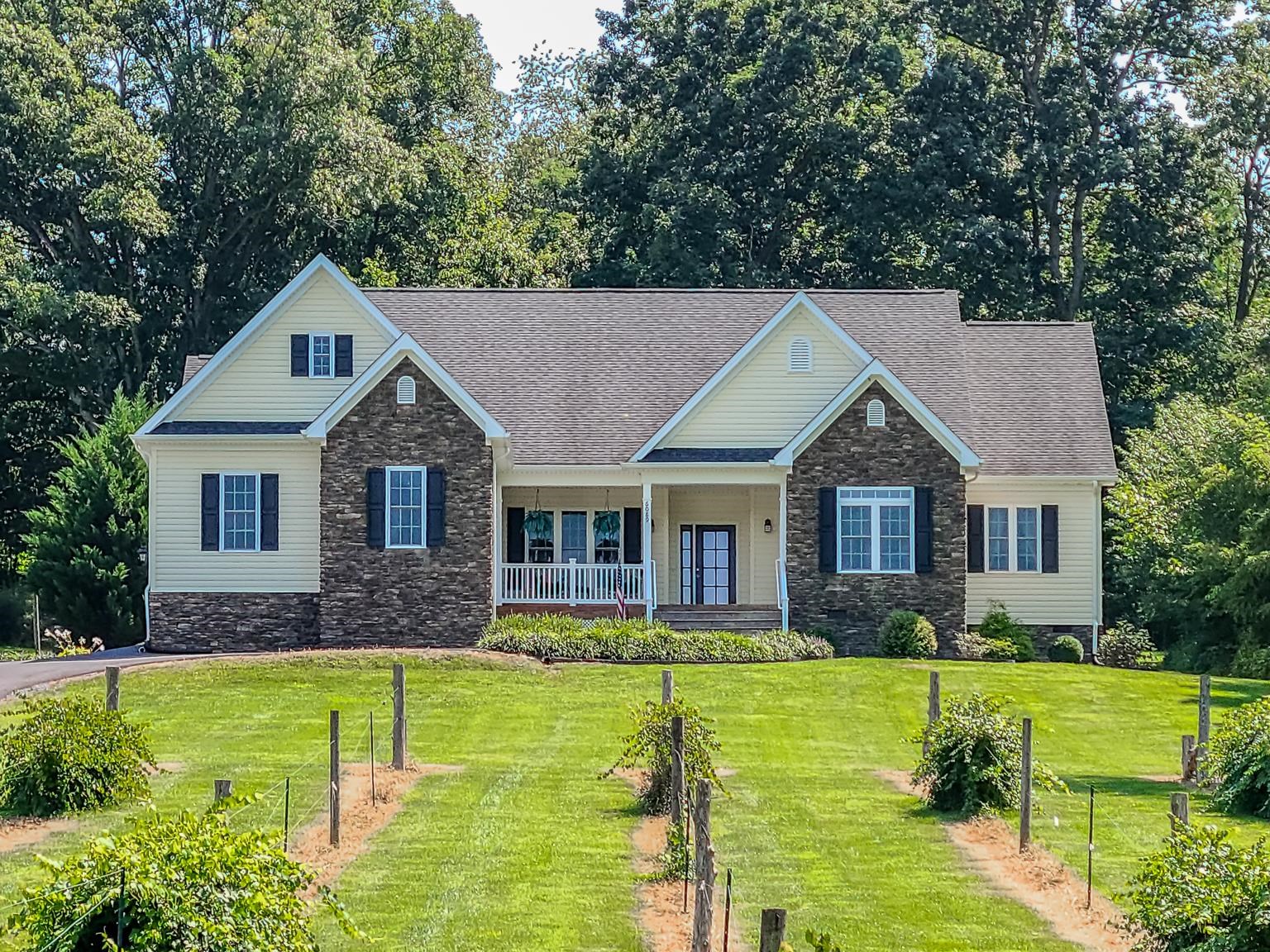 6089 Faughts Road Mount Crawford, VA 22841 - Photo 2 of 68 a front view of house with yard and green space