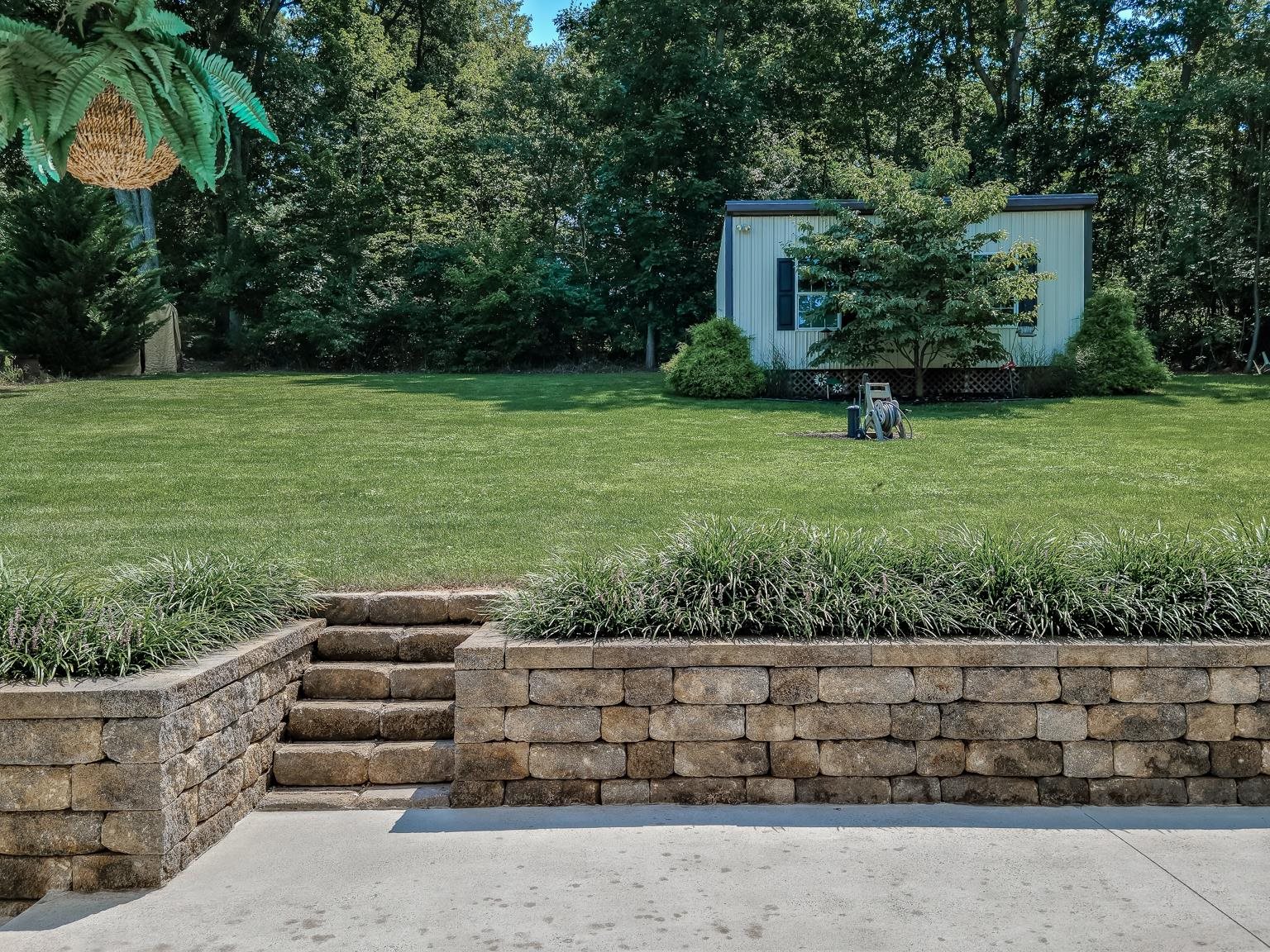 6089 Faughts Road Mount Crawford, VA 22841 - Photo 59 of 68 a view of a garden with a bench